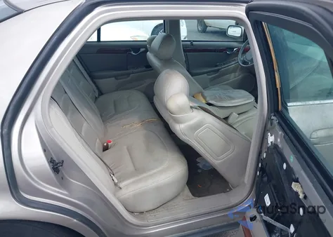 2003 Cadillac Deville Standard из США, поврежденный, VIN 1G6KD54Y63U257268